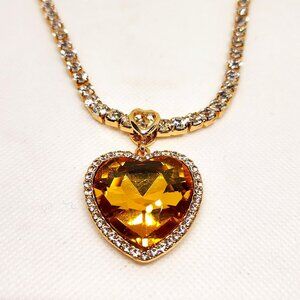 SOLD!  Yellow glass & Austrian Crystal heart necklace 20-22" in gold tone